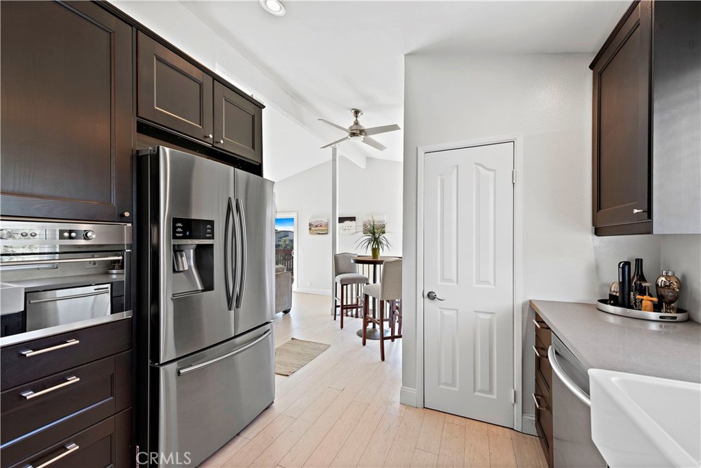 34072 Zarzito Dana Point, CA 92629 - Photo 11 of 44 a kitchen with stainless steel appliances a refrigerator and a sink