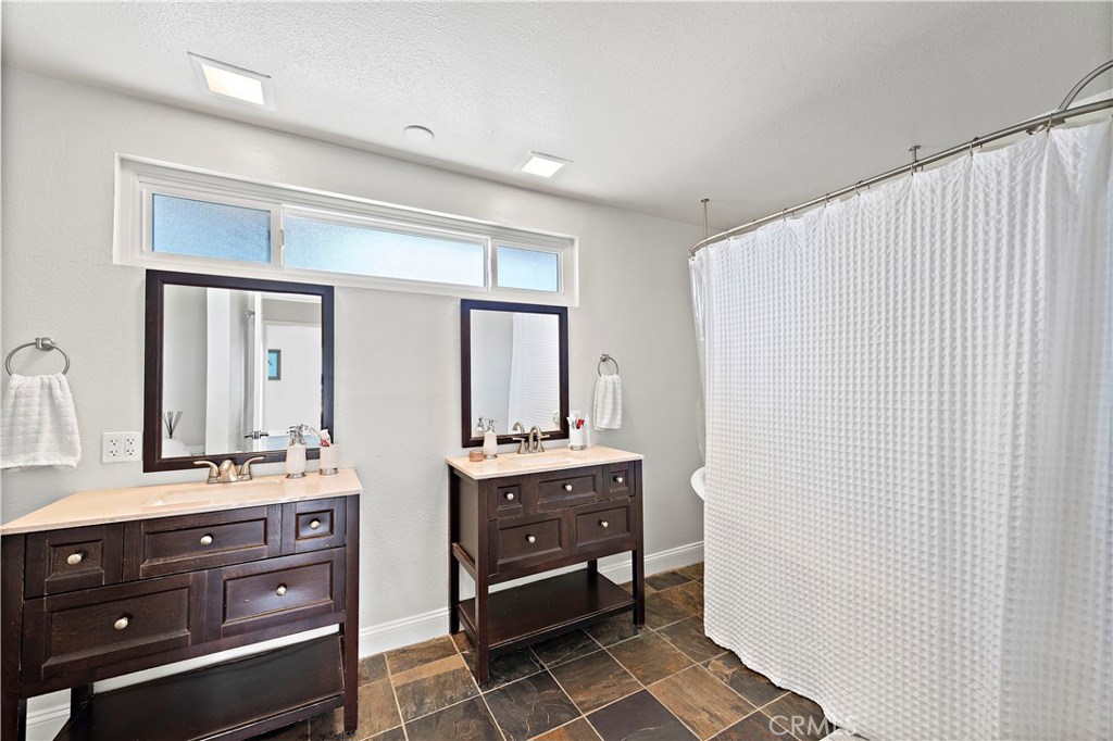 34072 Zarzito Dana Point, CA 92629 - Photo 15 of 44 a room with a dresser and a mirror