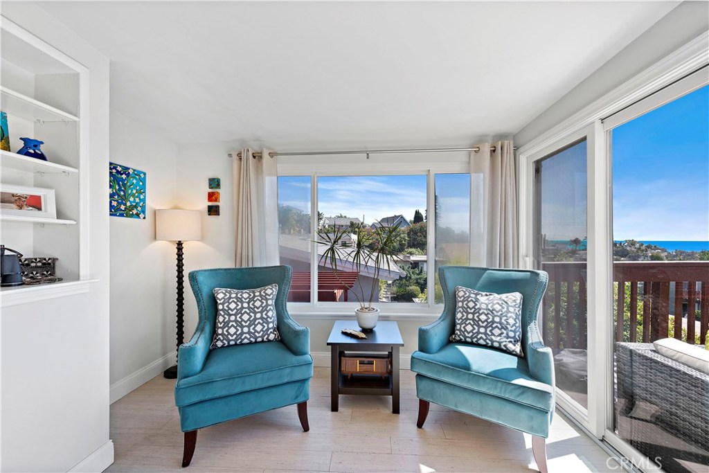 34072 Zarzito Dana Point, CA 92629 - Photo 6 of 44 a living room with furniture and a potted plant