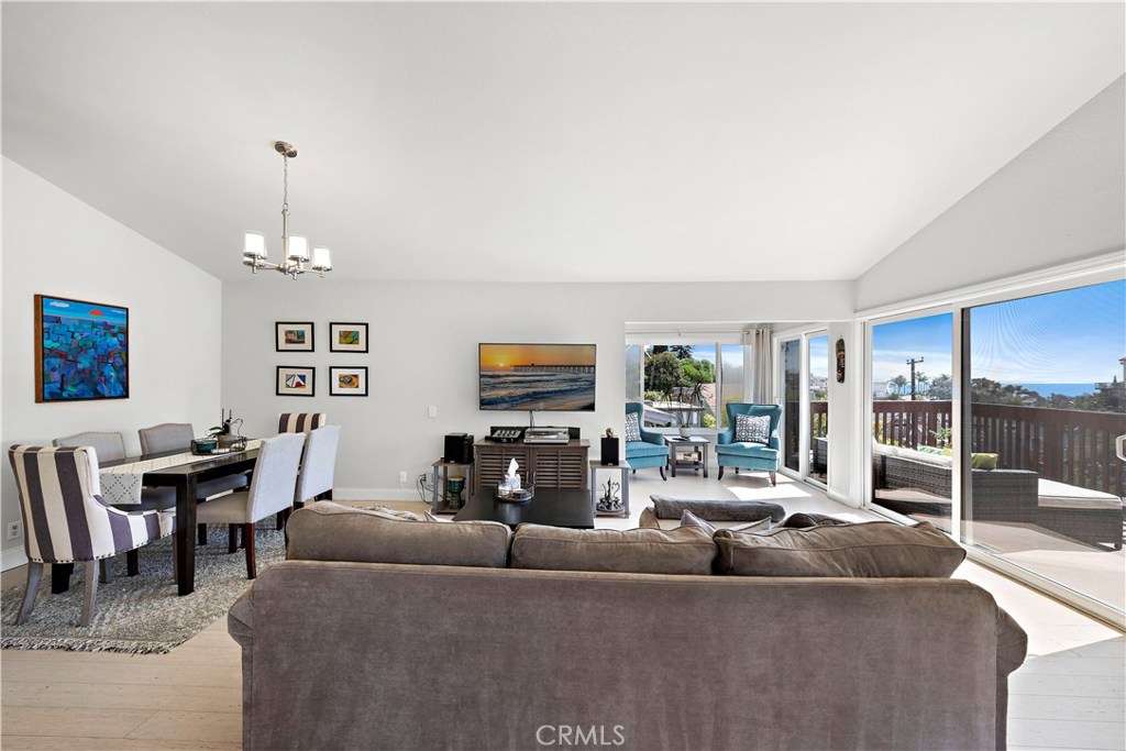 34072 Zarzito Dana Point, CA 92629 - Photo 9 of 44 a living room with furniture and a fireplace