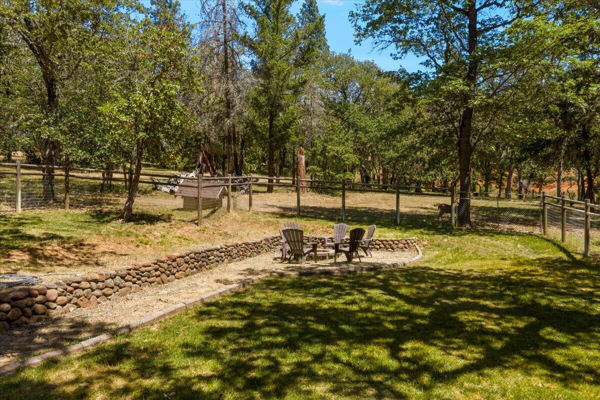 324 China Gulch Road Jacksonville, OR 97530 - Photo 37 of 45 a view of yard with swimming pool and sitting area