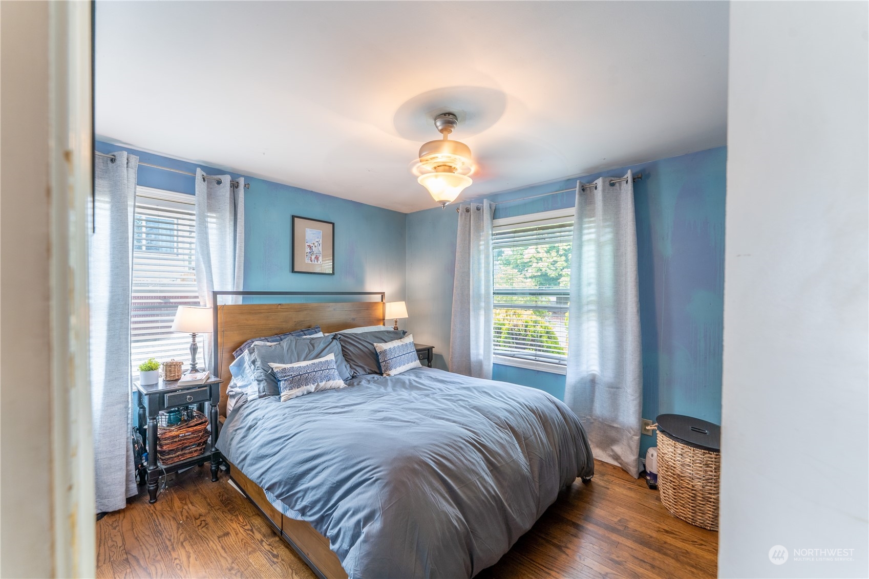 3509 Southwest Trenton Street Seattle, WA 98126 - Photo 13 of 23 a bedroom with a bed and a window
