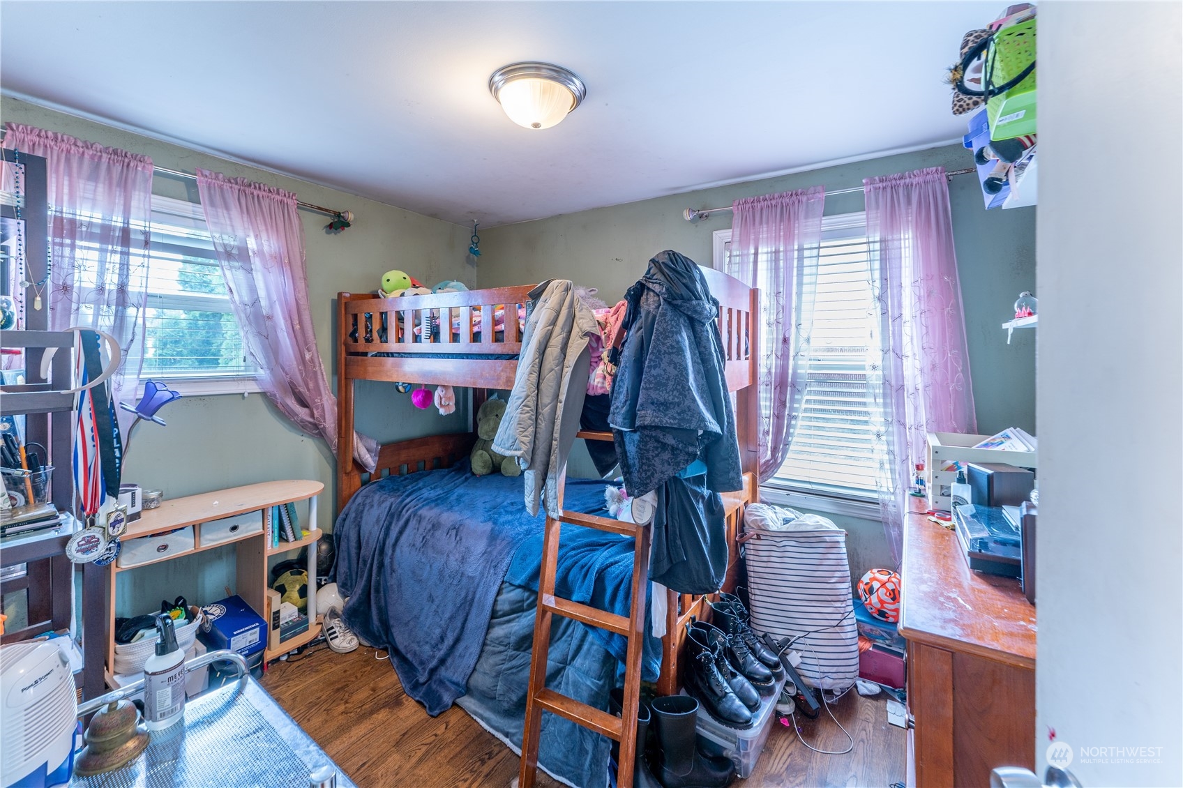 3509 Southwest Trenton Street Seattle, WA 98126 - Photo 14 of 23 a view of a room with furniture and a window