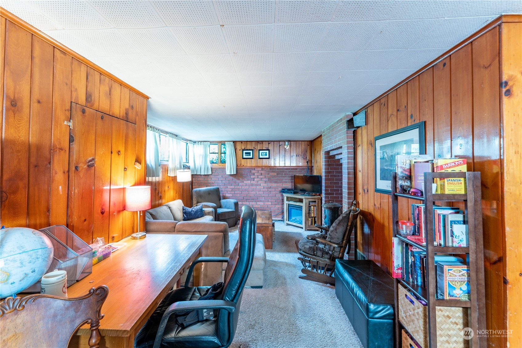 3509 Southwest Trenton Street Seattle, WA 98126 - Photo 17 of 23 a view of a workspace with furniture and toys