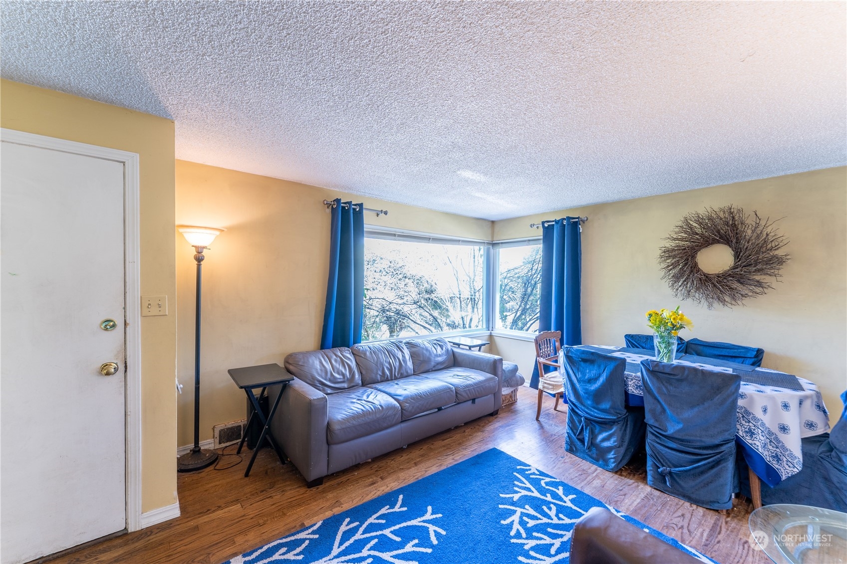 3509 Southwest Trenton Street Seattle, WA 98126 - Photo 7 of 23 a living room with furniture and a large window