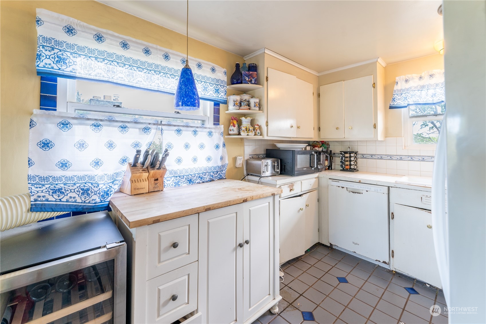 3509 Southwest Trenton Street Seattle, WA 98126 - Photo 10 of 23 a kitchen with a sink cabinets and window