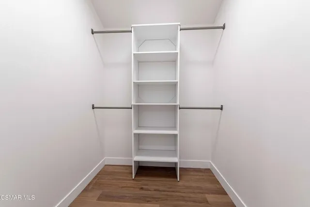 a view of an empty walk in closet