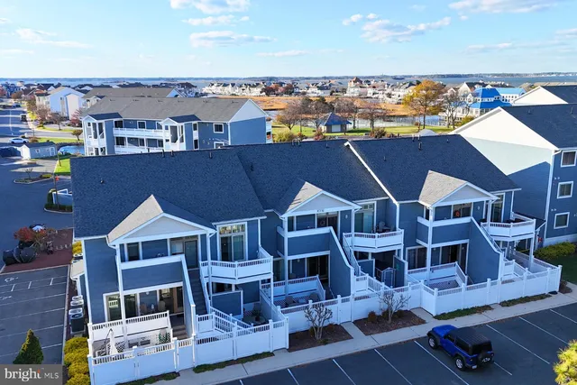 a aerial view of a house with wooden floor and city view