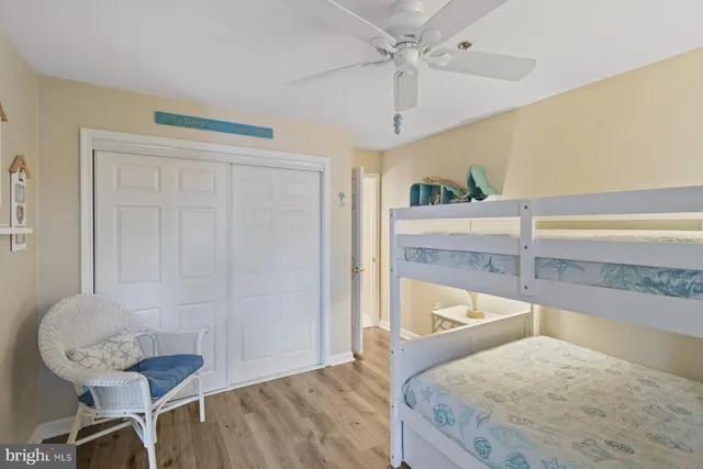 a bedroom with a bed and a table in it