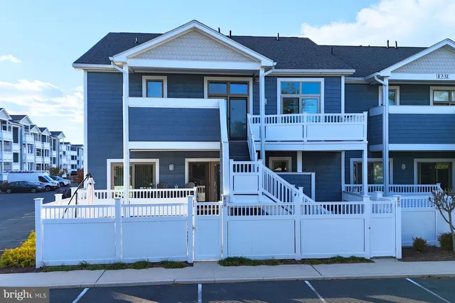 a front view of a house with a garage