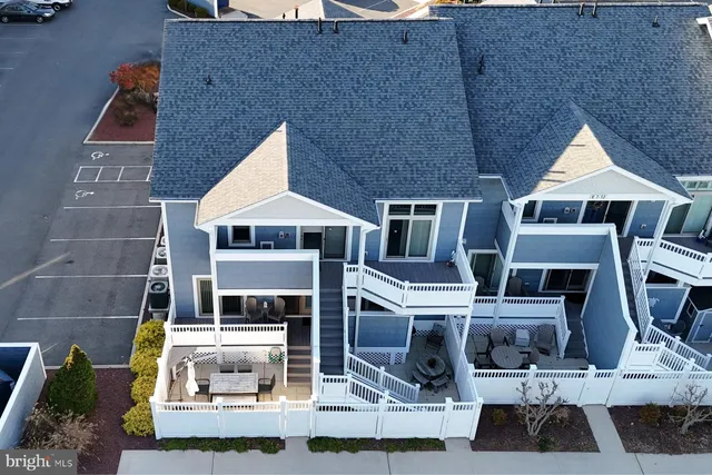 a front view of a house with parking area