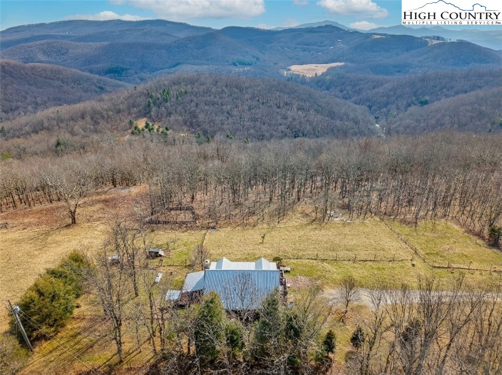 480 Schoolhouse Ridge Boone, NC 28607 - Photo 41 of 47 a view of swimming pool and mountain in the background