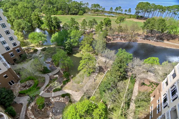 an aerial view of a houses with outdoor space and a lake view