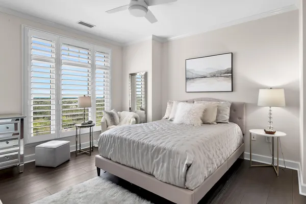 a bedroom with a bed and a couch
