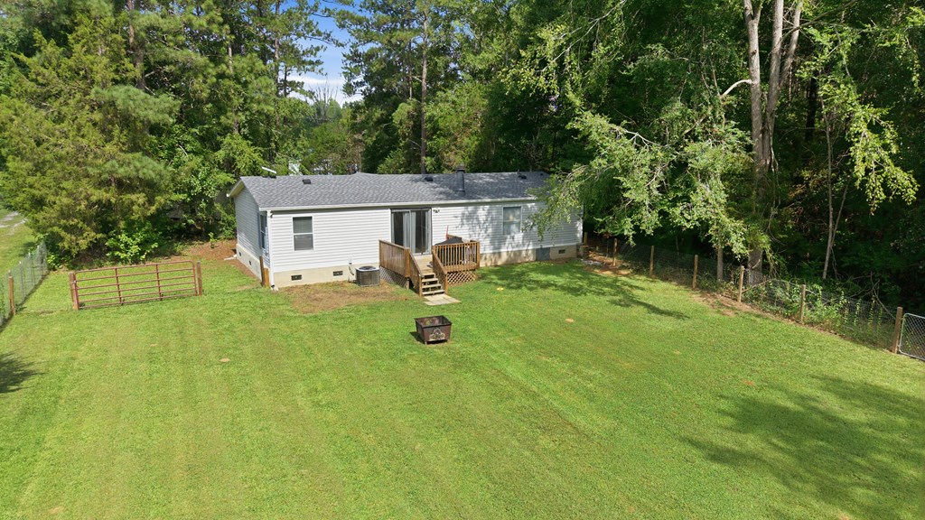 503 Whitten Road Waterloo, SC 29384 - Photo 26 of 31 a view of a house with backyard and a tree