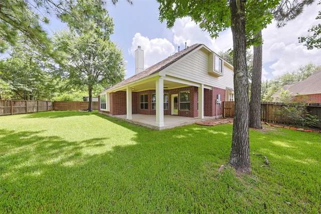 $545,000 | 403 Woodpecker Forest Lane, Conroe, TX 77384