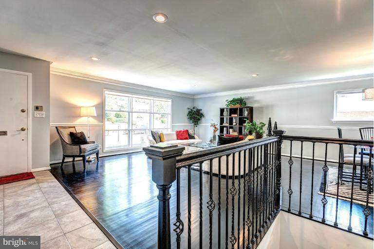 4537 Maryknoll Road Baltimore, MD 21208 - Photo 5 of 30 a view of a dining room with furniture window and wooden floor