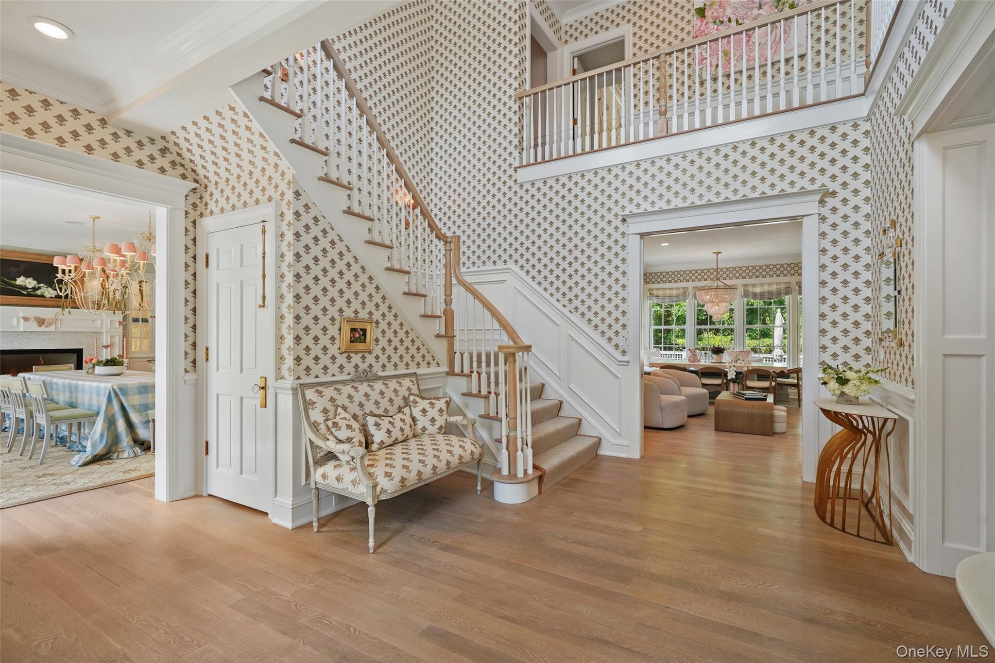 27 Murray Hill Road Scarsdale, NY 10583 - Photo 8 of 29 a view of a livingroom with furniture and stairs
