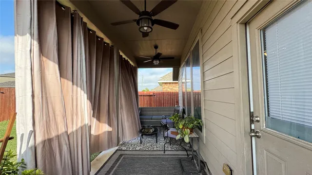 a view of balcony with furniture