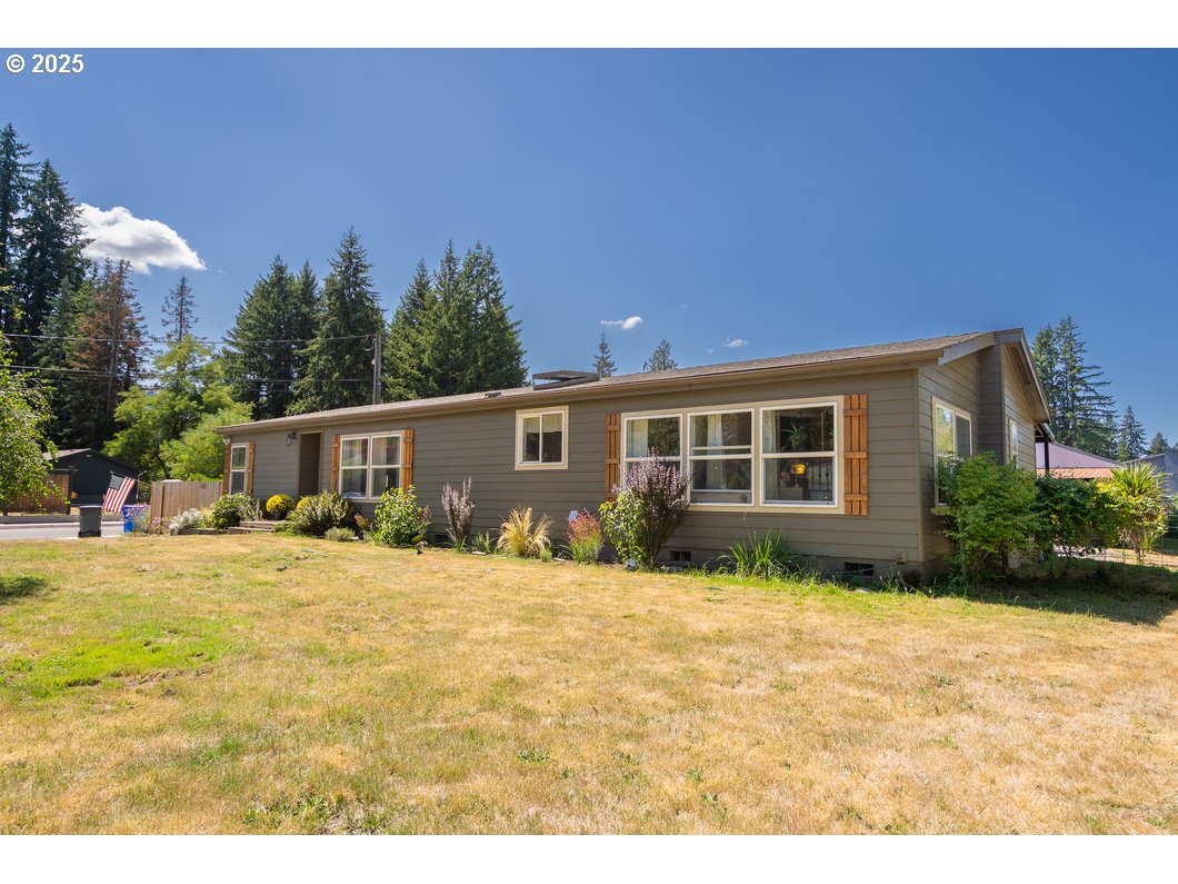 a view of a house with a yard