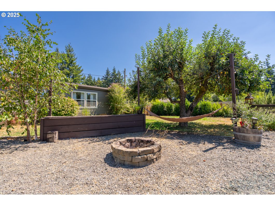 165 8th Place Mill City, OR 97360 - Photo 25 of 39 a view of a backyard with a patio