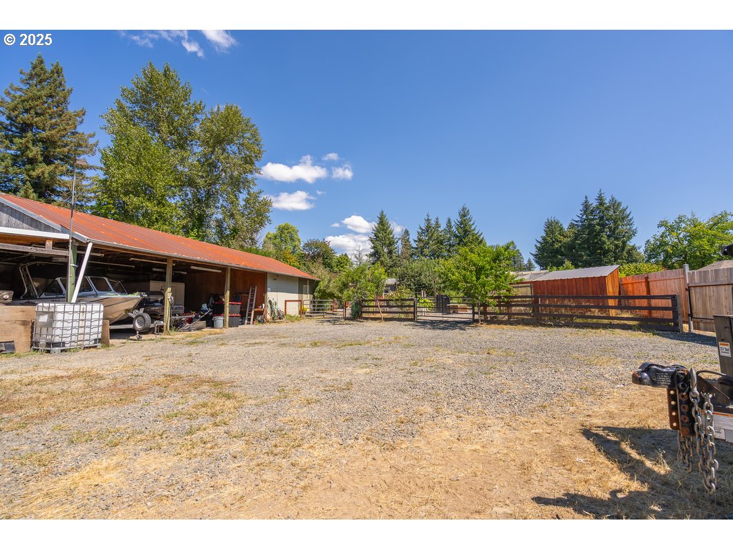 165 8th Place Mill City, OR 97360 - Photo 32 of 39 a view of a house with backyard and sitting area