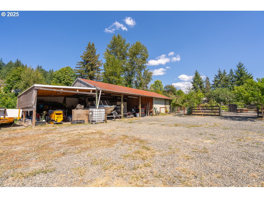 165 8th Place Mill City, OR 97360 - Photo 33 of 39 a view of a house with backyard and sitting area