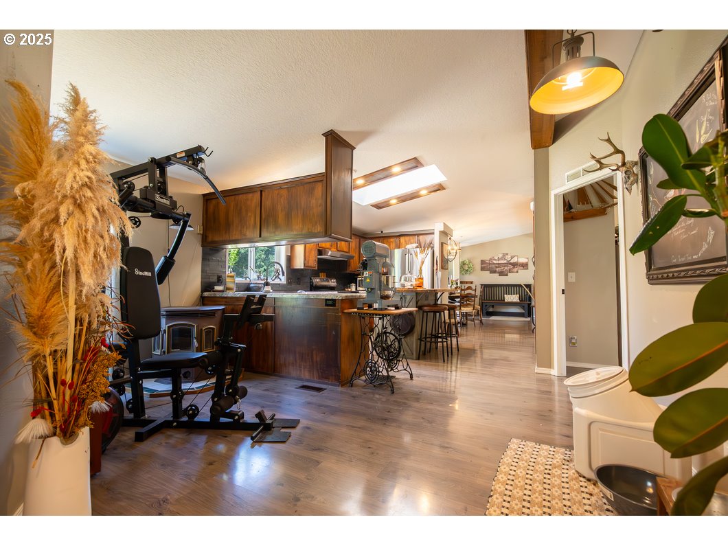 165 8th Place Mill City, OR 97360 - Photo 8 of 39 a living room with lots of furniture and a painting on the wall