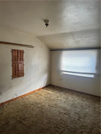 a view of an empty room with window