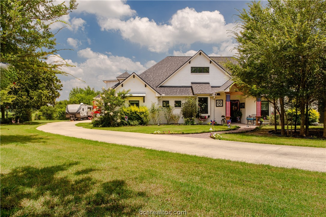 5036 Glory Road Bryan, TX 77808 - Photo 1 of 50 Pristine acreage setting with a custom Cape Cod style home