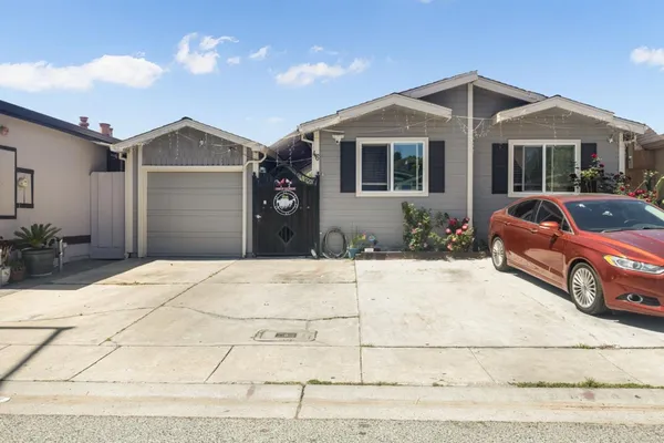 a front view of a house with a garage