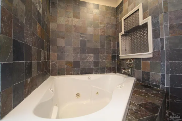 a bathroom with a tub