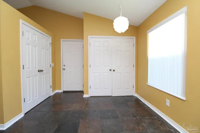a view of a bathroom with wooden floor