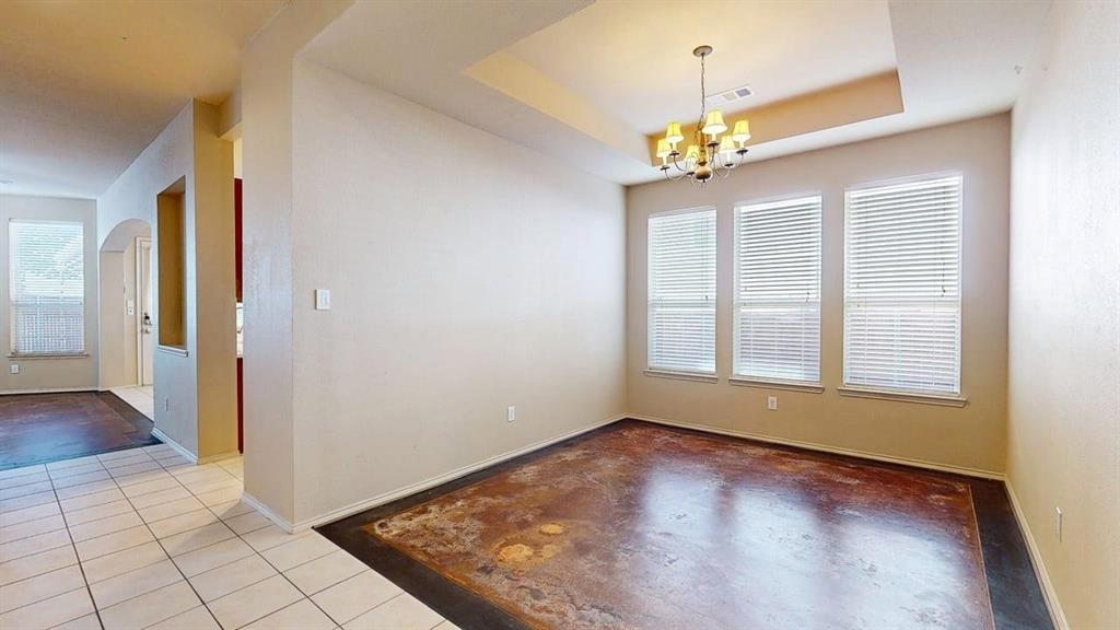 1910 Wickersham Lane Corinth, TX 76210 - Photo 11 of 38 wooden floor in an empty room with a window