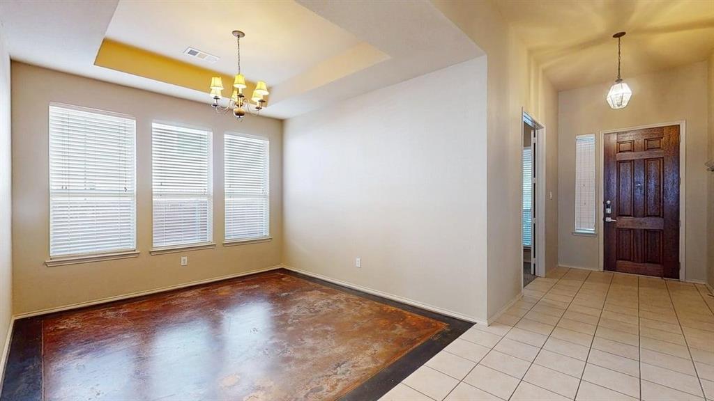 1910 Wickersham Lane Corinth, TX 76210 - Photo 12 of 38 wooden floor in an empty room with a window