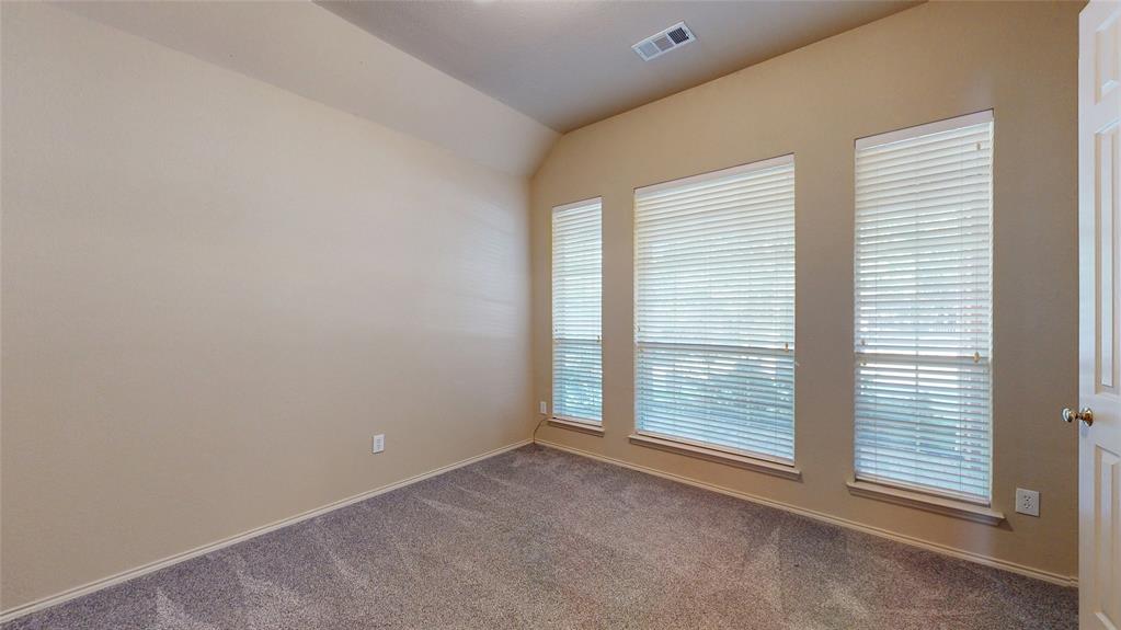 1910 Wickersham Lane Corinth, TX 76210 - Photo 13 of 38 an empty room with windows