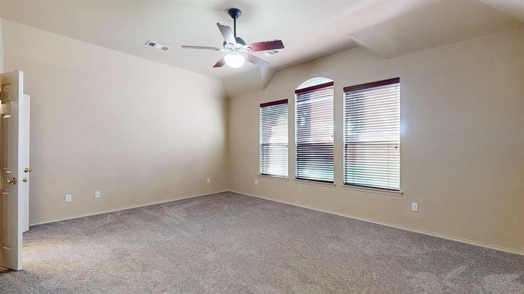 1910 Wickersham Lane Corinth, TX 76210 - Photo 15 of 38 a view of an empty room with a window