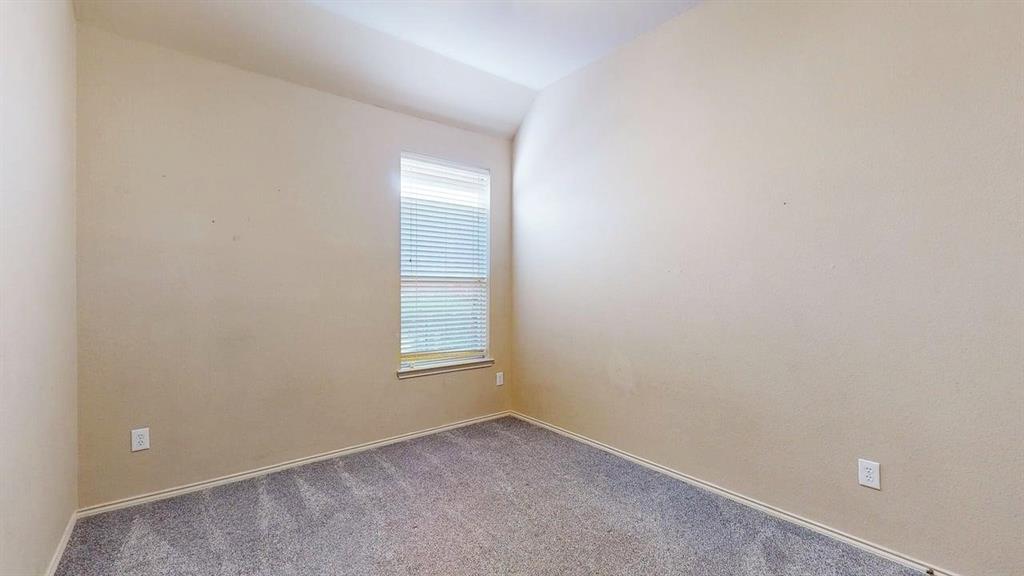 1910 Wickersham Lane Corinth, TX 76210 - Photo 23 of 38 an empty room with windows