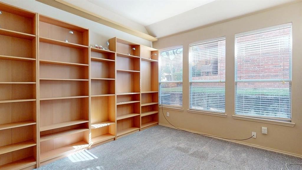 1910 Wickersham Lane Corinth, TX 76210 - Photo 25 of 38 a view of an empty room with a window