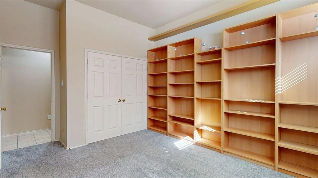 1910 Wickersham Lane Corinth, TX 76210 - Photo 26 of 38 a view of room with empty shelves