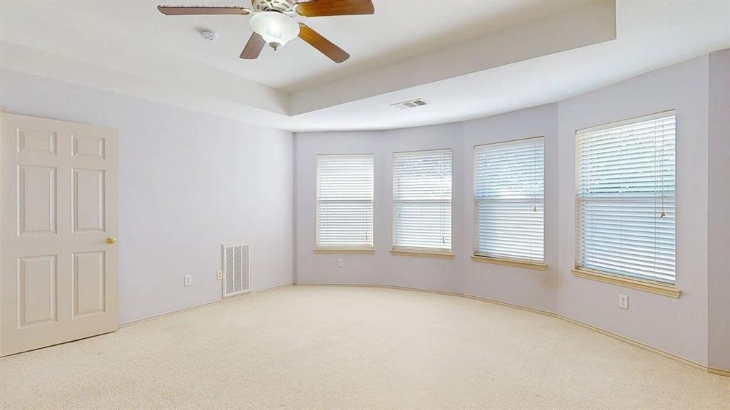 1910 Wickersham Lane Corinth, TX 76210 - Photo 35 of 38 a view of an empty room with a window