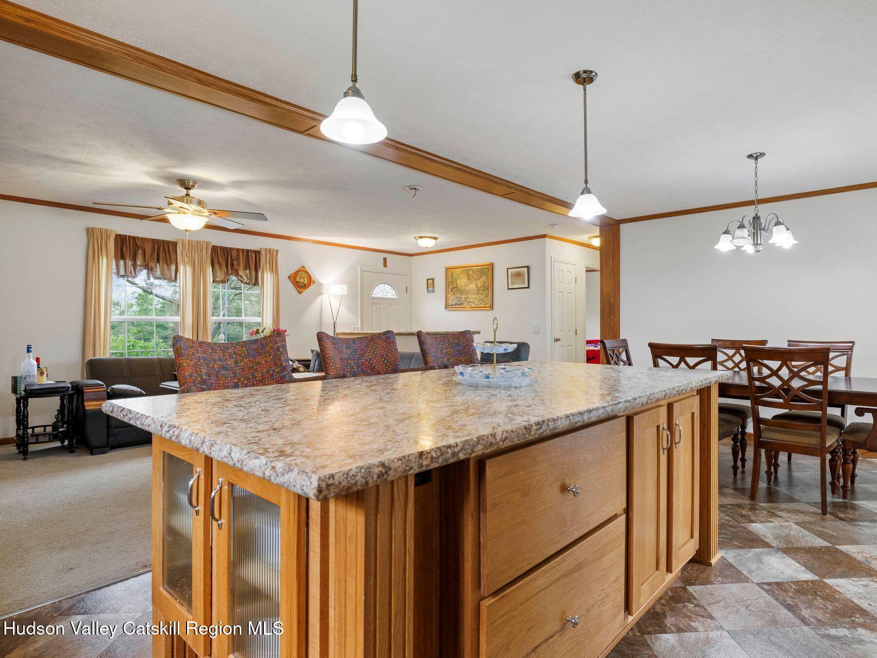 137 Mountain Pond View Road Gilboa, NY 12076 - Photo 20 of 38 a kitchen with a counter a sink and wooden floor