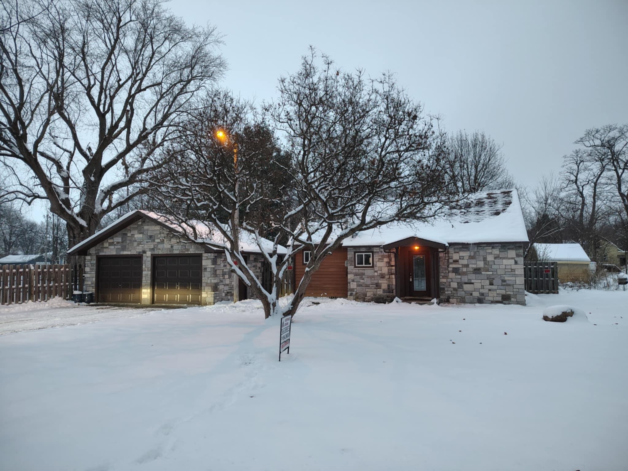 23809 Shelby Road Lowell, IN 46356 - Photo 18 of 19 a view of house with a yard covered with snow in front of house