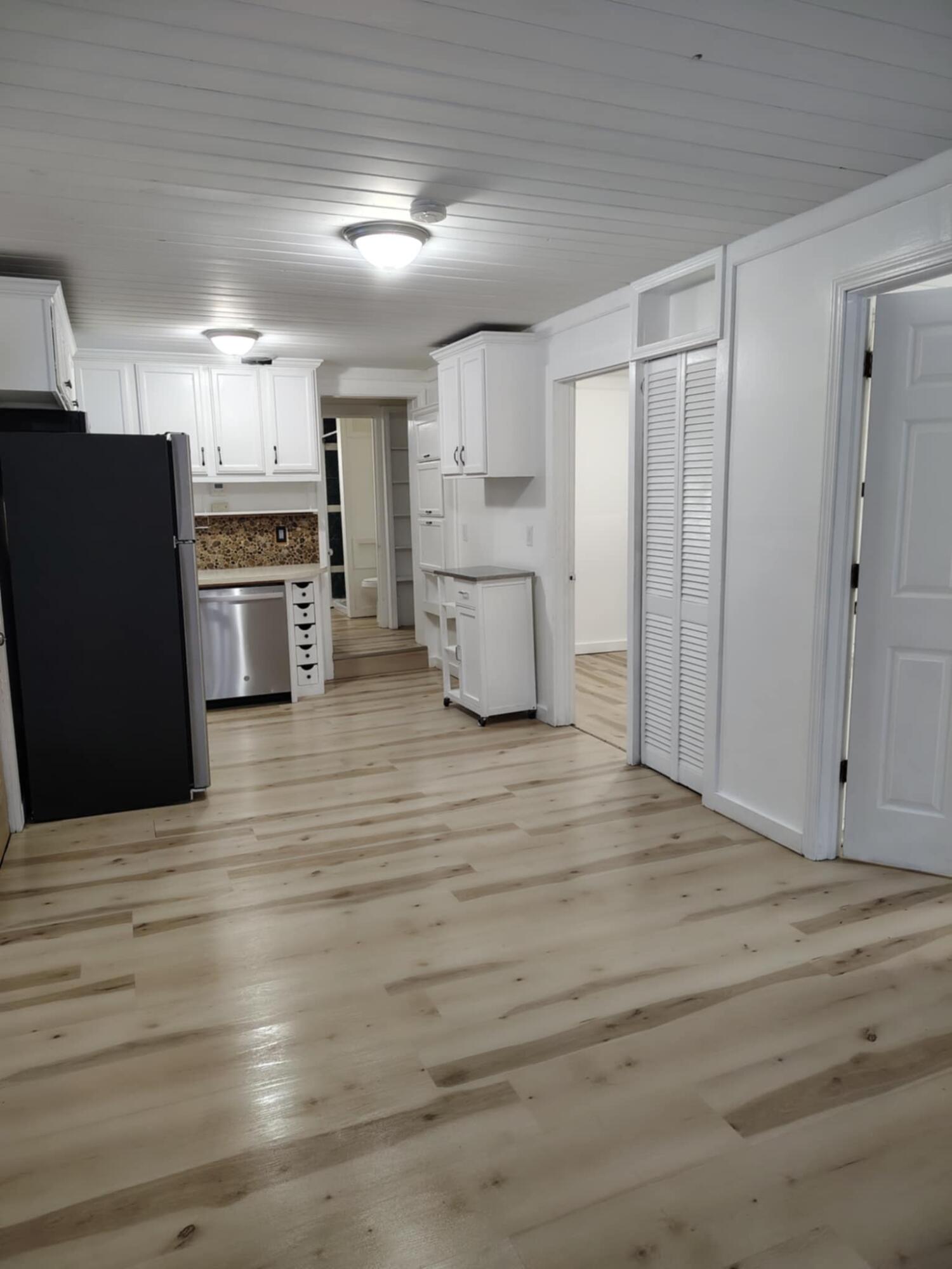 23809 Shelby Road Lowell, IN 46356 - Photo 4 of 19 a kitchen with stainless steel appliances kitchen island granite countertop a refrigerator and a stove top oven