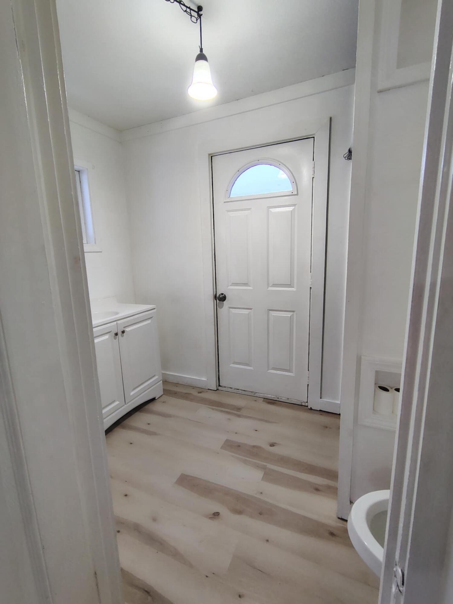 23809 Shelby Road Lowell, IN 46356 - Photo 6 of 19 wooden floor in an empty room