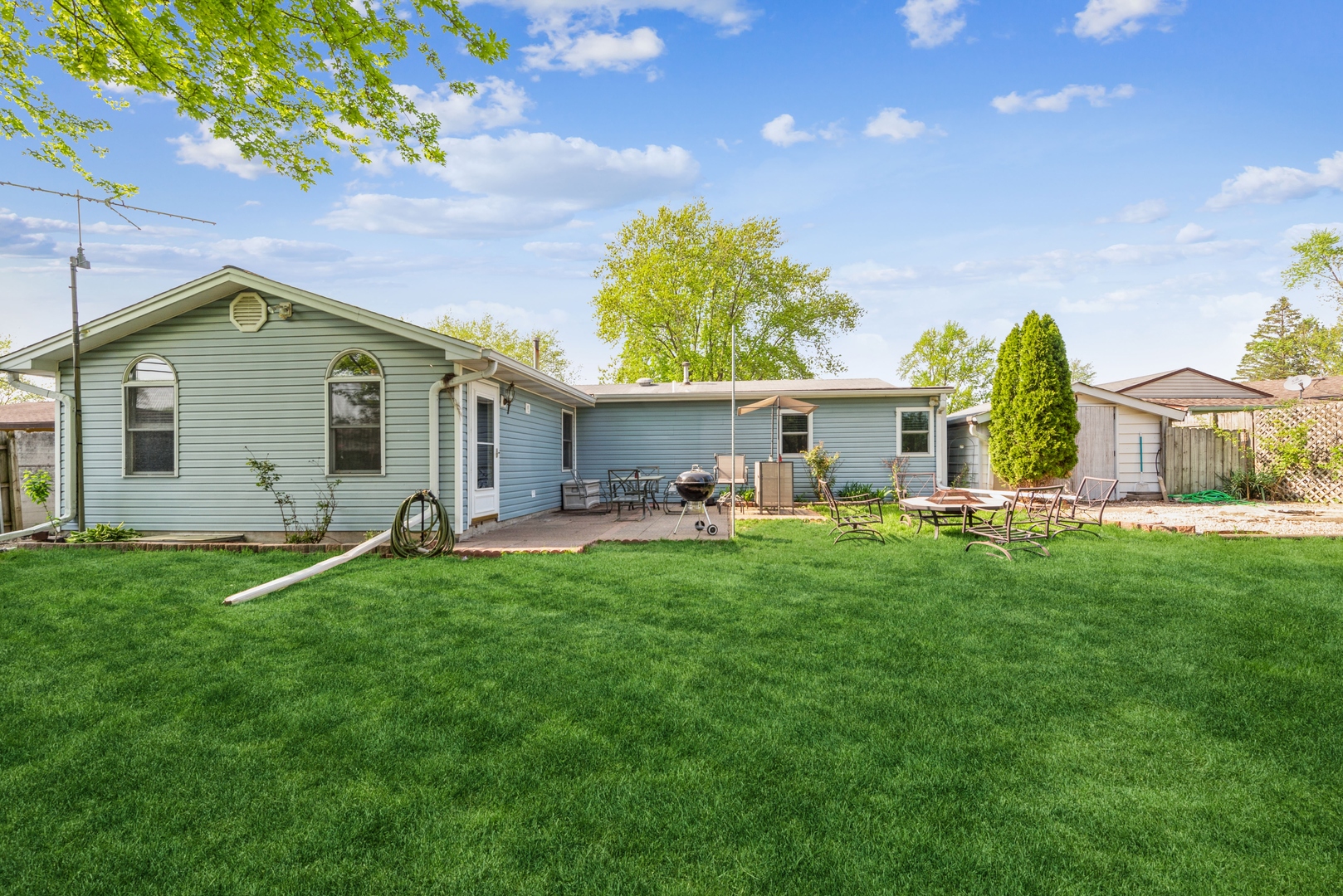318 Dunbar Road Wauconda, IL 60084 - Photo 14 of 15 a front view of a house with yard porch and furniture