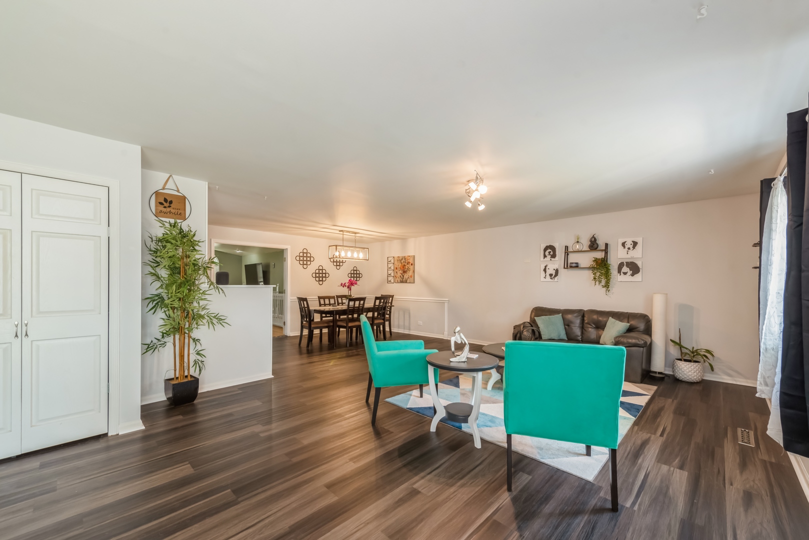318 Dunbar Road Wauconda, IL 60084 - Photo 2 of 15 a living room with furniture and wooden floor