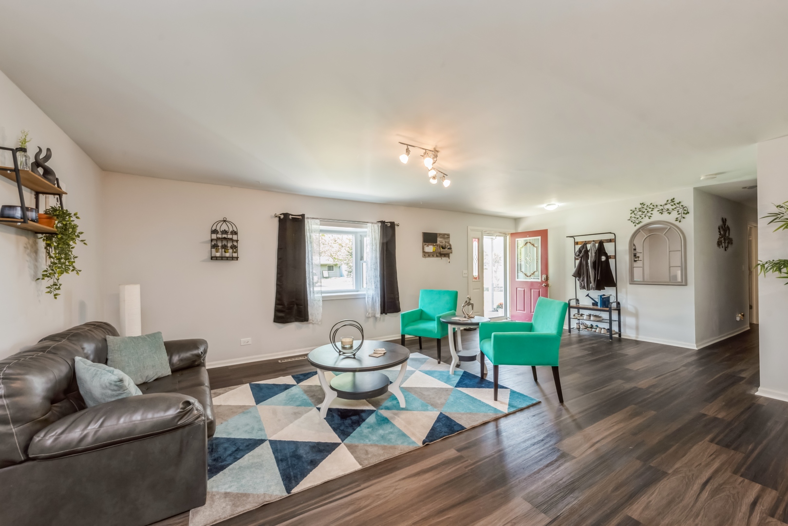 318 Dunbar Road Wauconda, IL 60084 - Photo 3 of 15 a living room with furniture and wooden floor