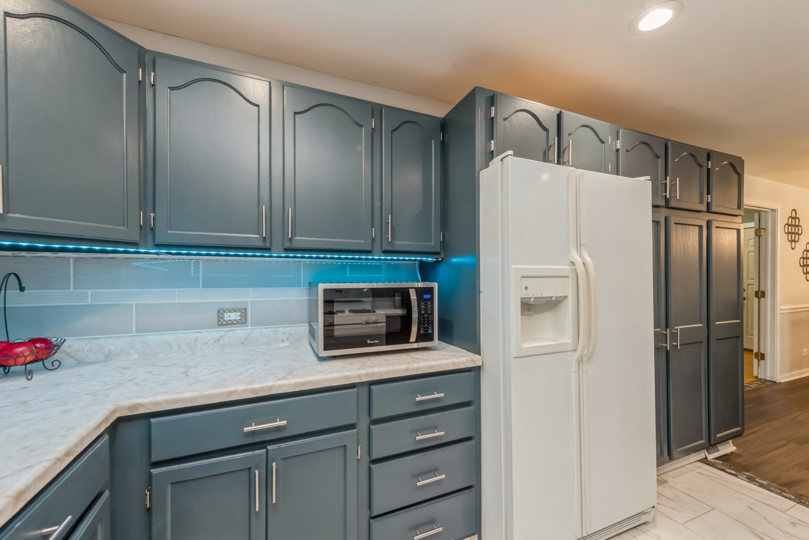 318 Dunbar Road Wauconda, IL 60084 - Photo 5 of 15 a kitchen with stainless steel appliances a refrigerator and cabinets