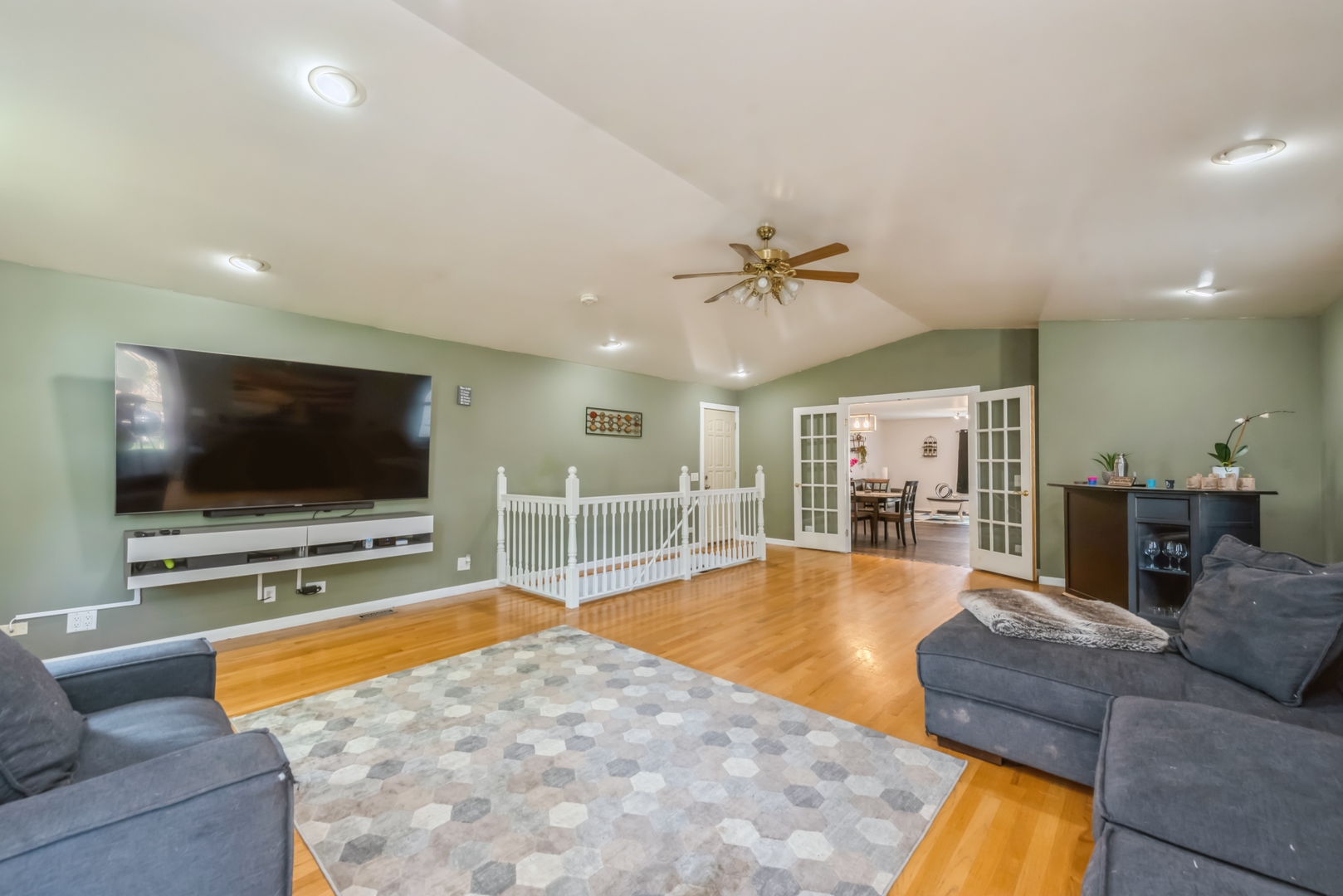 318 Dunbar Road Wauconda, IL 60084 - Photo 7 of 15 a living room with furniture and a flat screen tv